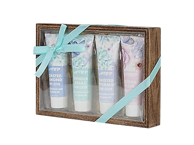 Conjunto de 4 loções florais perfumadas para as mãos em uma caixa amadeirada para todos os tipos de pele 1